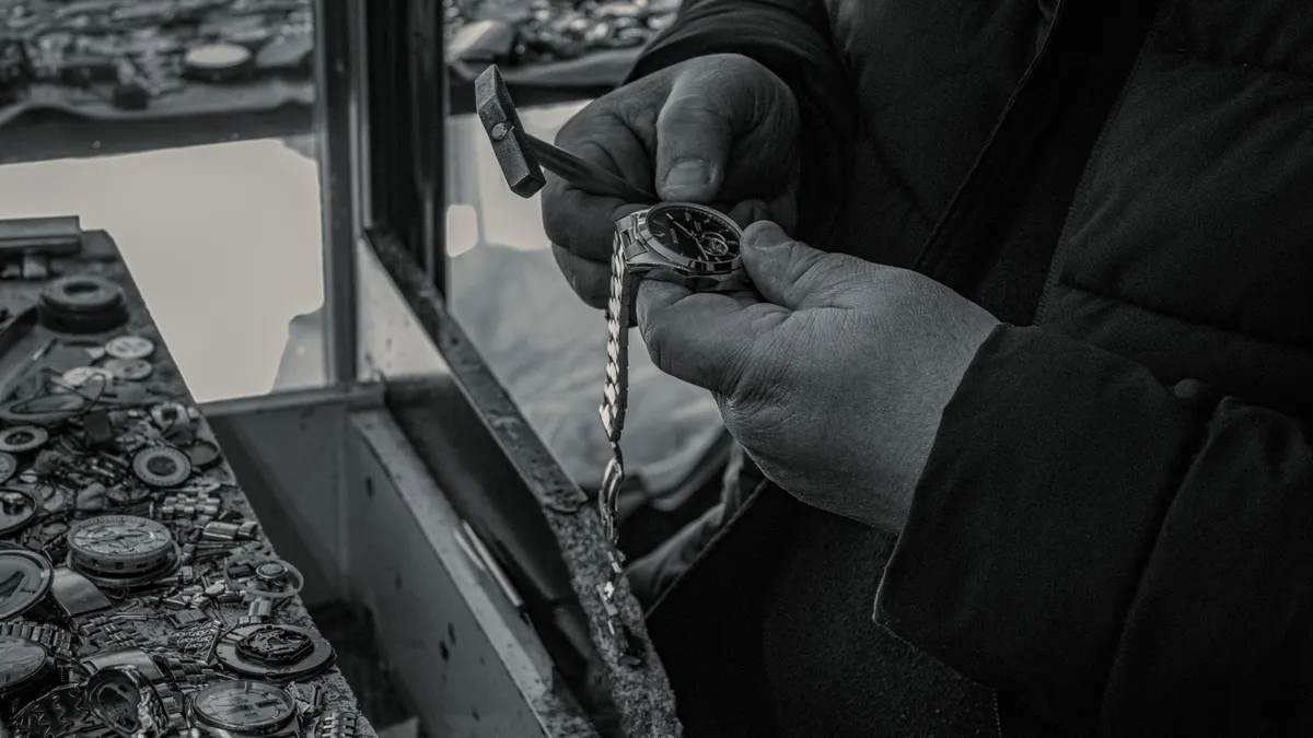 Best New SaaS Tools to Watch for Teams in 2026 — Watchmaker Repairing Watch with Precision Tools