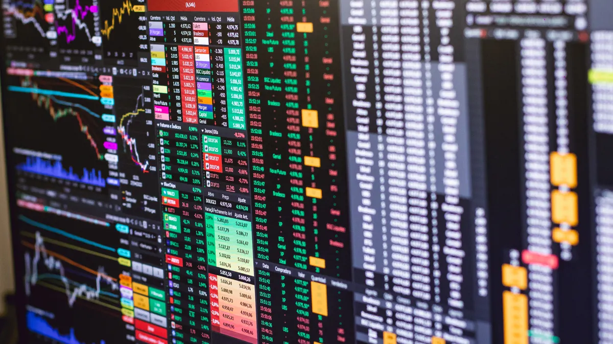 Stock market-style charts and data screens