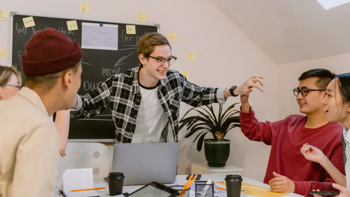 How to Track SaaS News Without Missing Major Product Launches — Office Team Having a Meeting