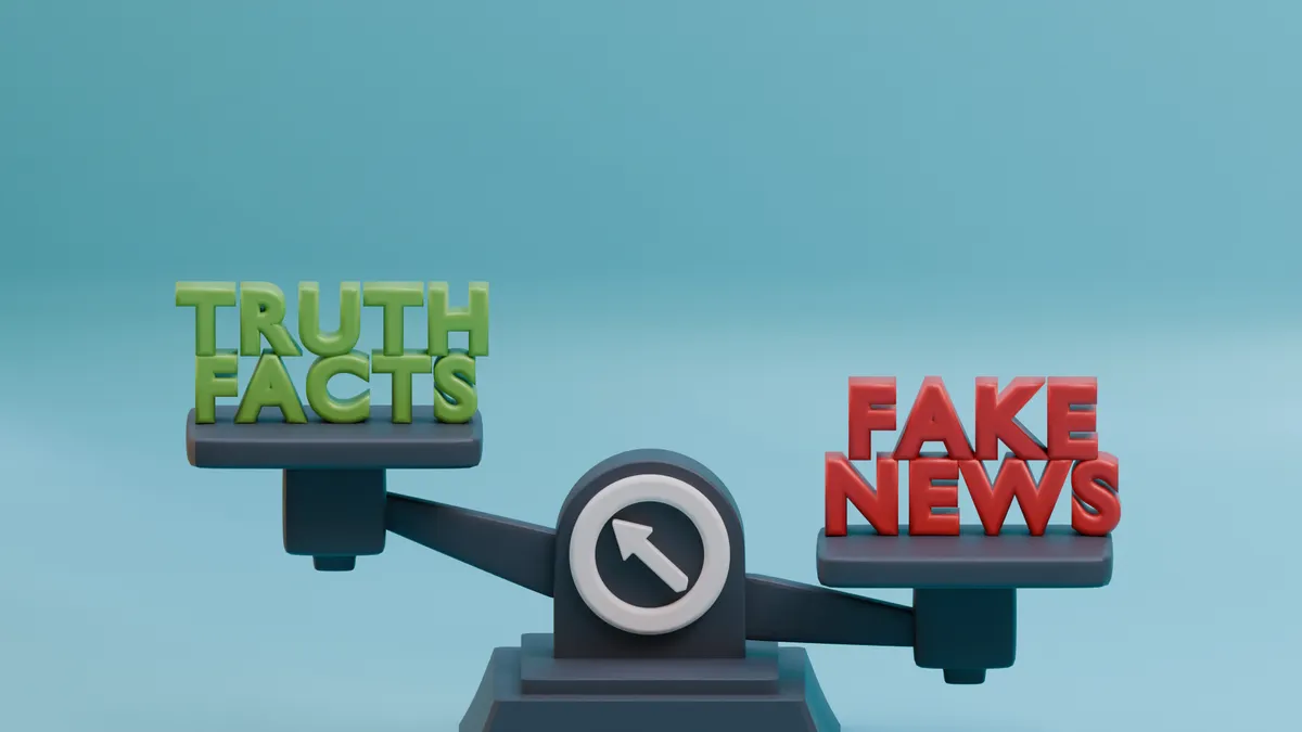 balance scale comparing truth and fake news