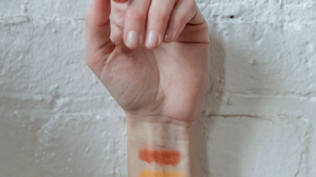 SaaS Product Reviews: What to Test in a First-Hand Evaluation — Crop unrecognizable woman holding hand near brick wall a